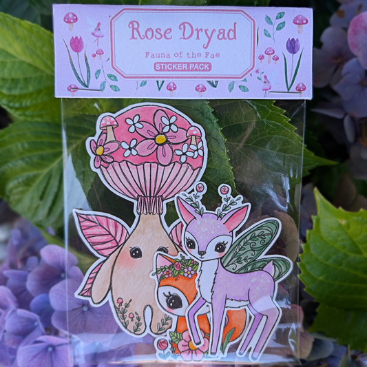Sticker pack with fairy-themed stickers on a background of purple hydrangea and green leaves.